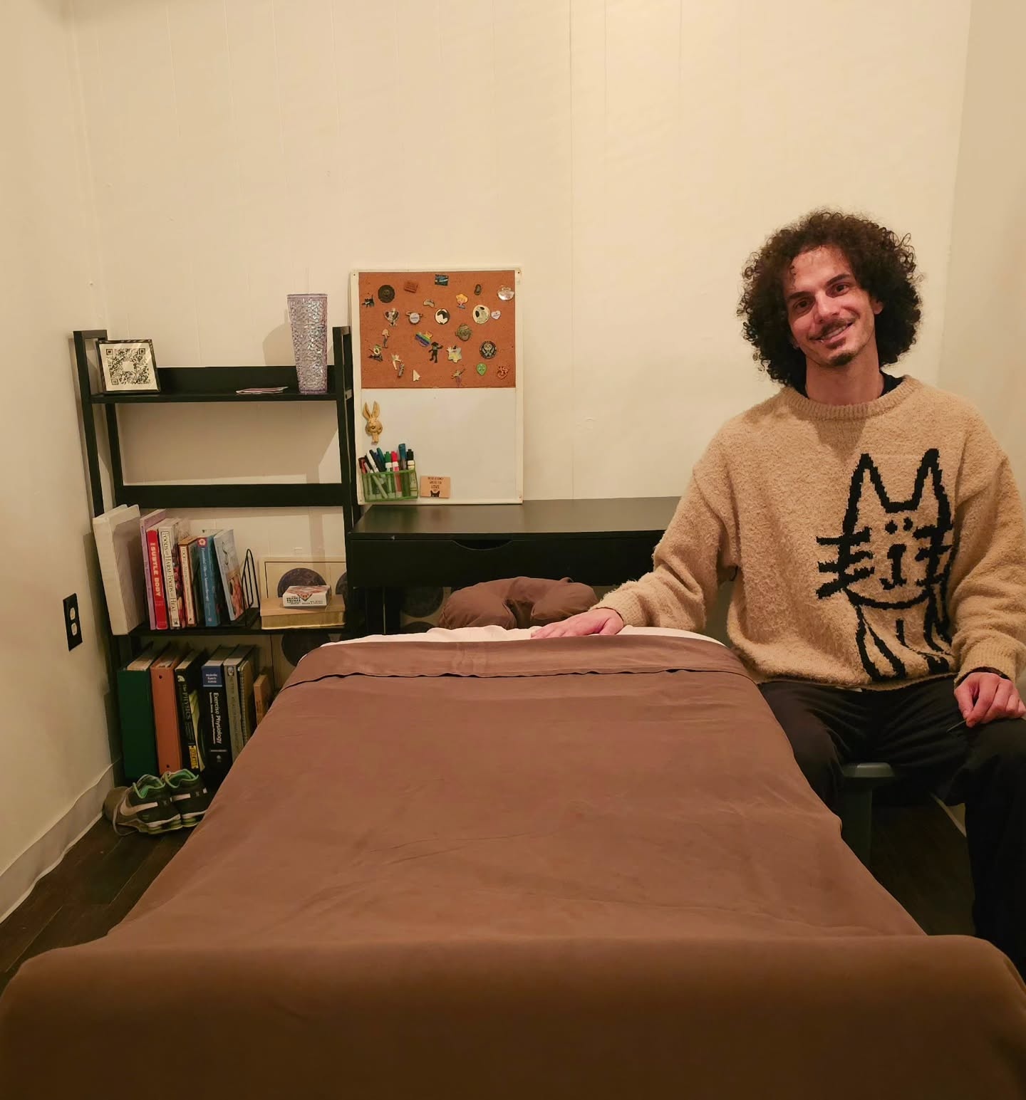 Beto at the massage table ready for your session